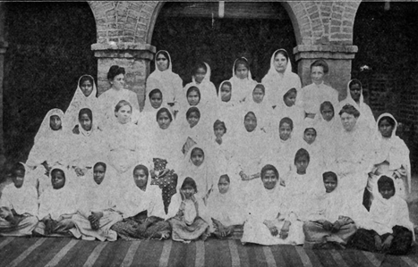 about forty pupils in white
