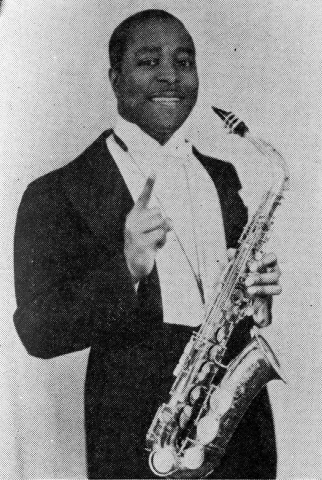 photograph of Louis Jordan holding his saxaphone