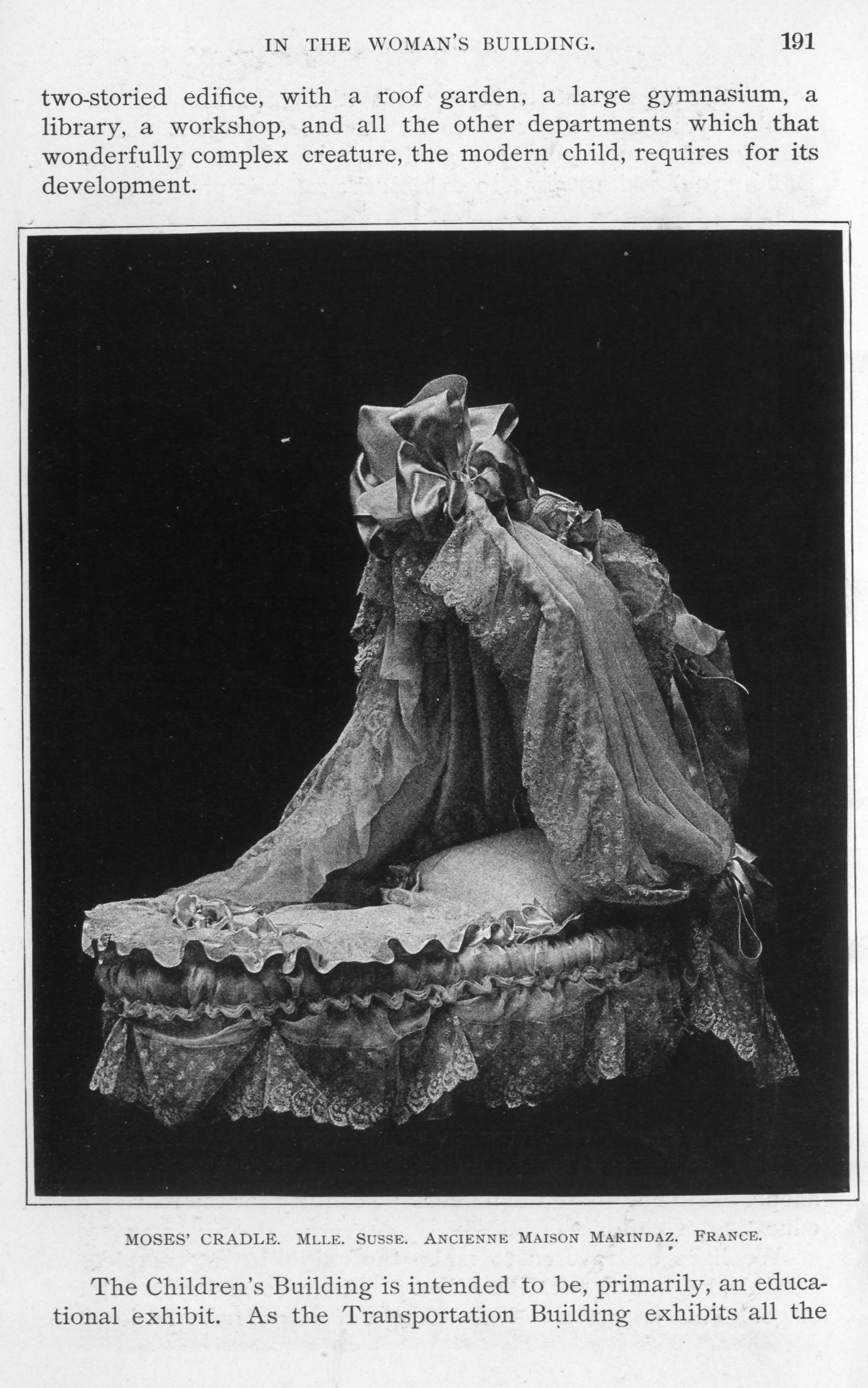 cradle with bonnet, all decorated with lace and ribbon