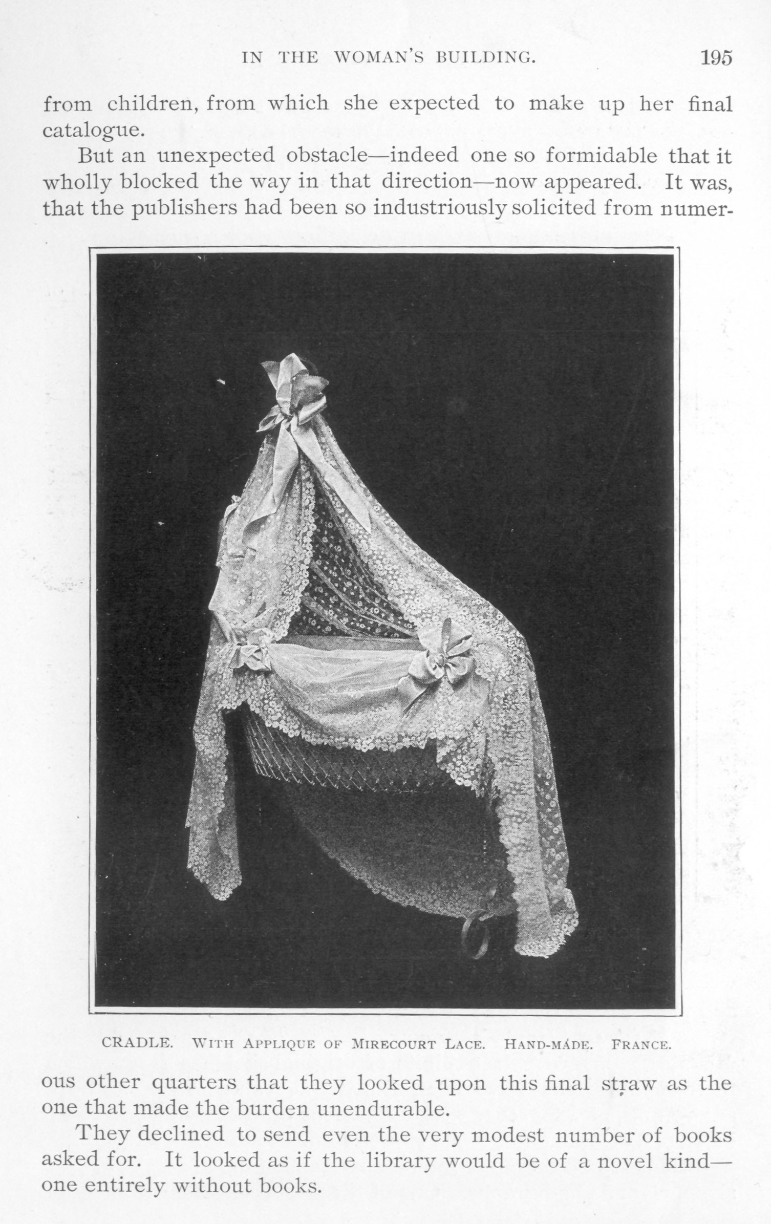 cradle with bonnet, all decorated with lace