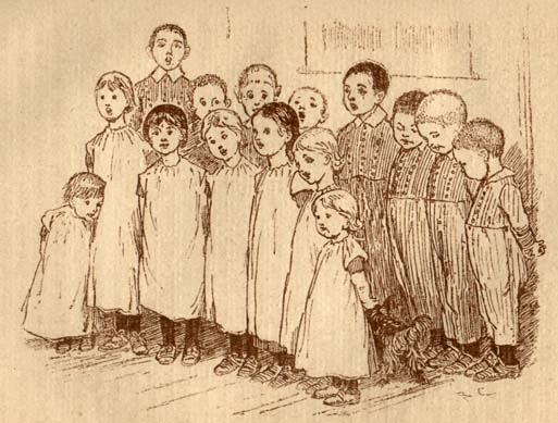 Group of young boys and girls singing.