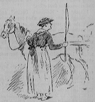 woman standing with horse hitched to cart