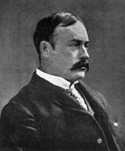 photograph of man with mustache in profile