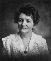 photograph of woman with short curly hair