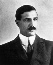 man with dark hair and mustache