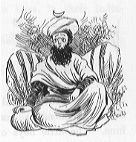 Boy with long fake beard seated on floor wearing turban and flowing clothes.