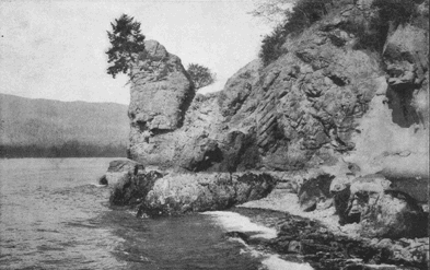 rocky outcropping above a body of water