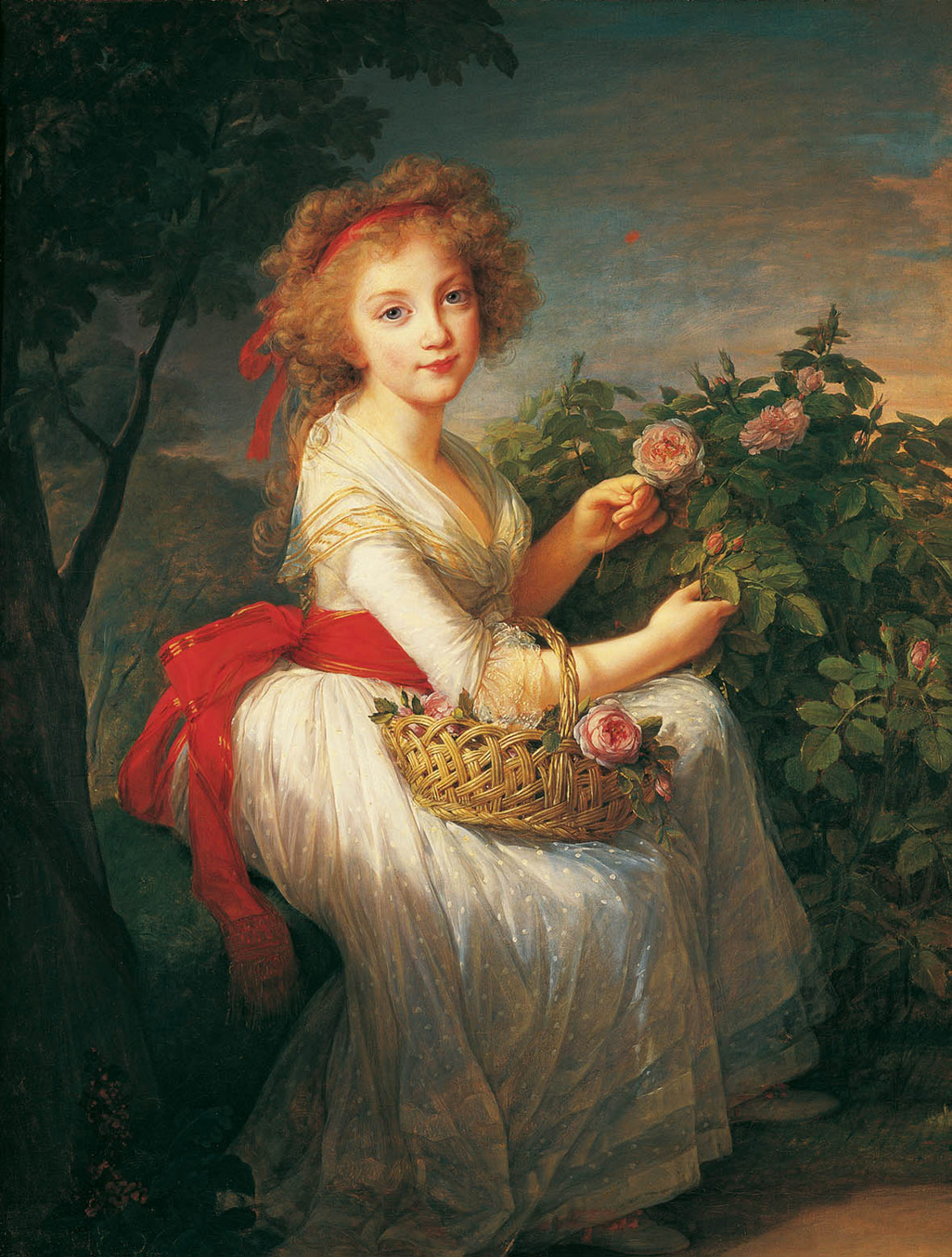 Portrait of a young woman with a basket of pink roses