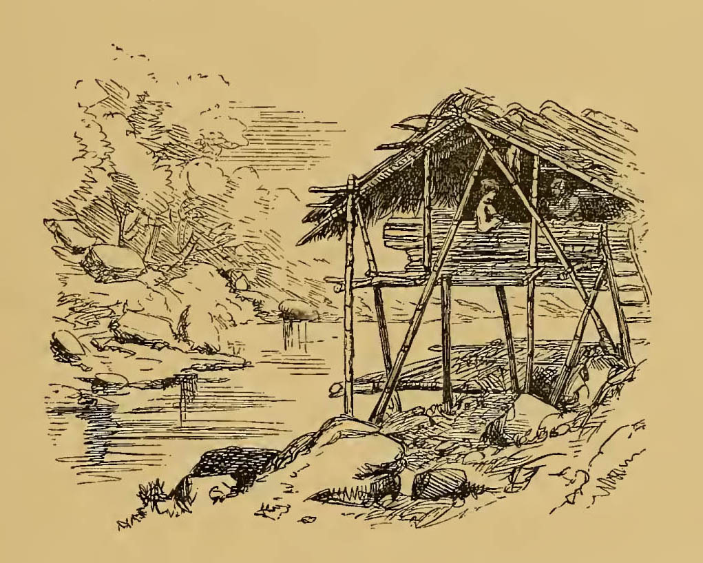 woman sitting in hut by the water