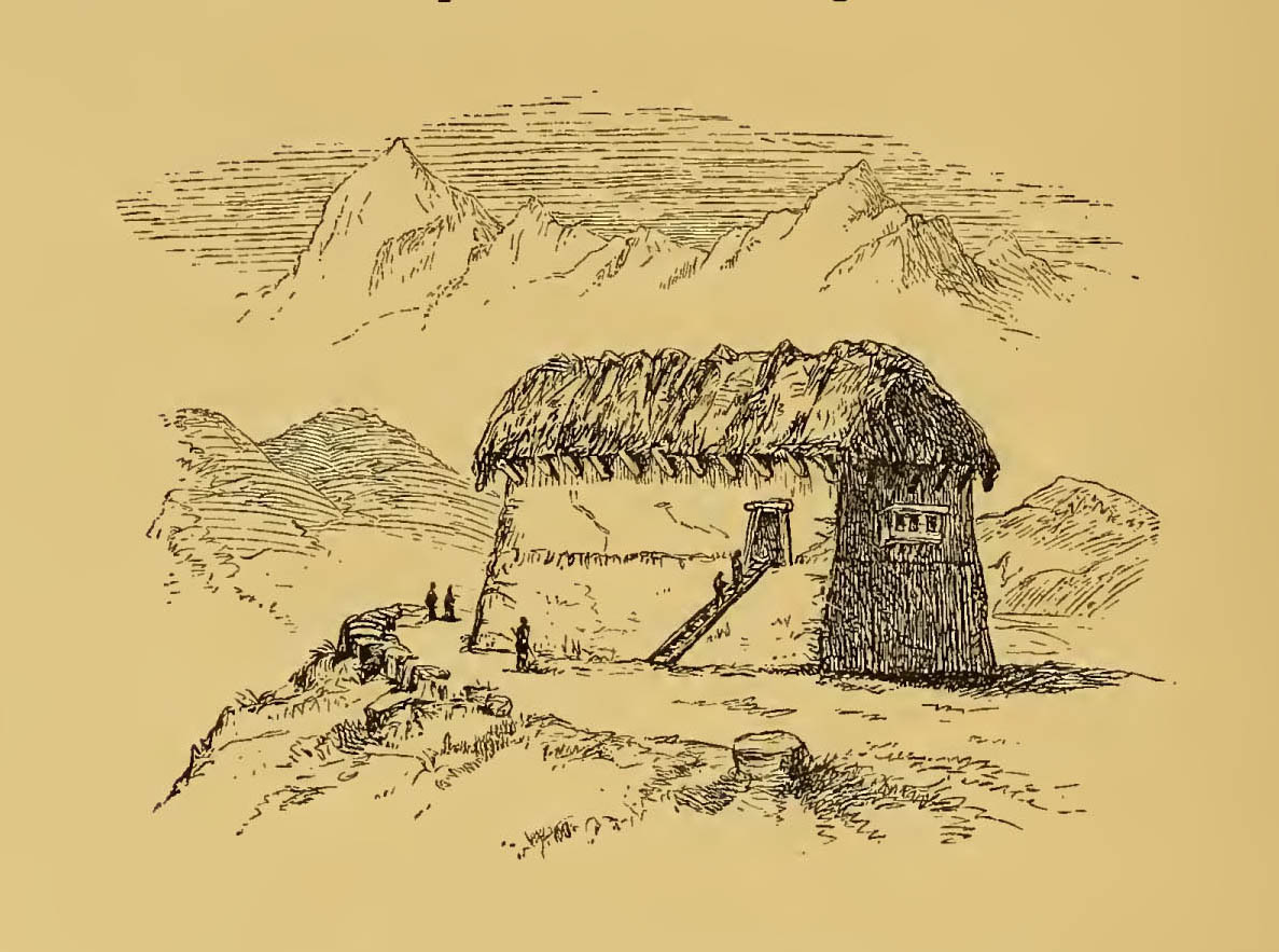 large building with thatched roof, mountains in distance