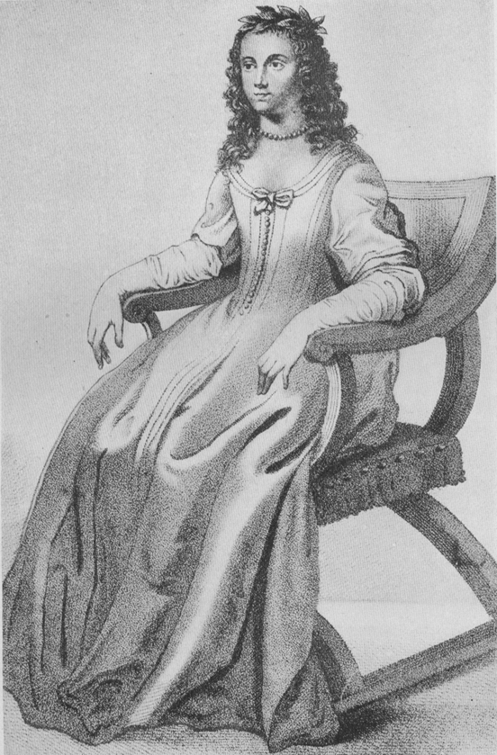 seated woman with curly hair in front-laced dress
