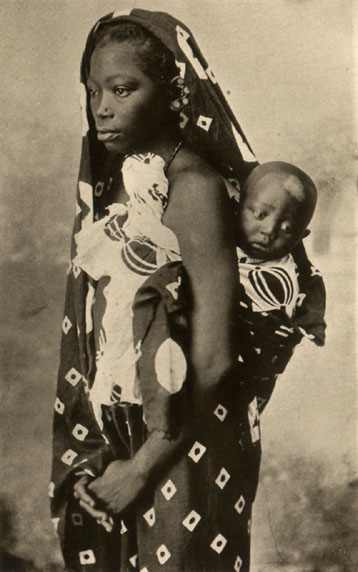 woman carrying child on her back