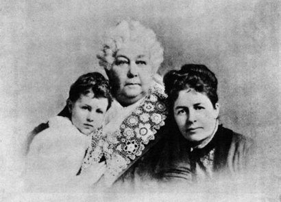 Elizabeth Cady Stanton flanked by a girl on the left and a woman on the right.