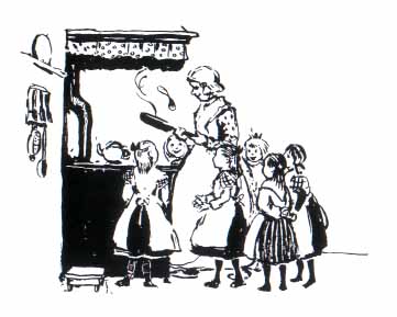 Children standing around a woman flipping pancakes at the stove.