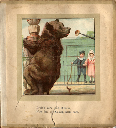 children looking at a bear in a zoo enclosure