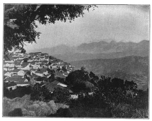 village overlooking mountains