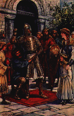 Knight in armor standing amid a group of people.