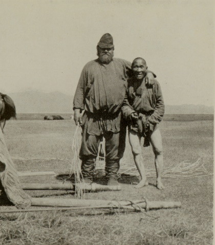 Russian man standing with Mongolian man
