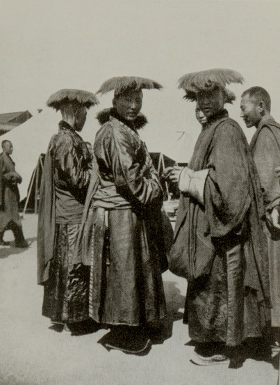 group of men in dark robes