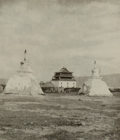 two large pyramid-like structures with spires