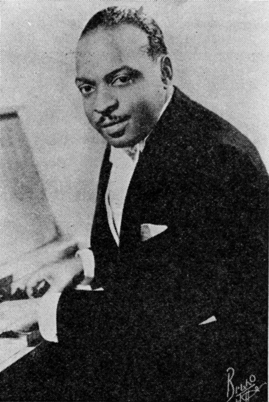 photograph of Count Basie at the piano