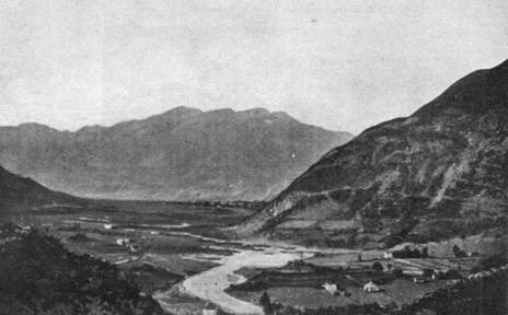 photograph from a distance of the valley below.