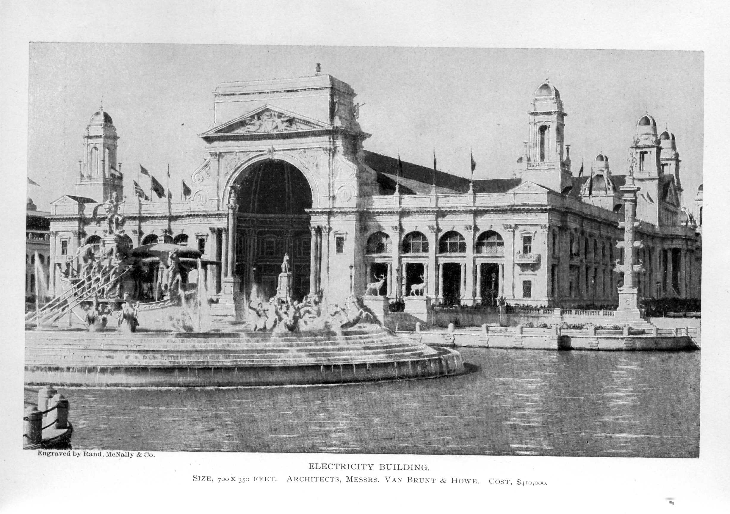 large ornate building with arched doorway, columns, and domed towers