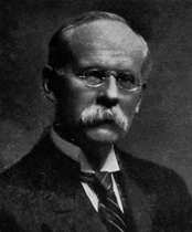 man with mustache and glasses
