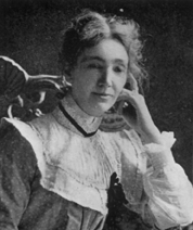 photograph of woman in high-collared dress