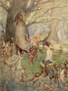 Boy sitting in the midst of a wood surrounded by fairies.
