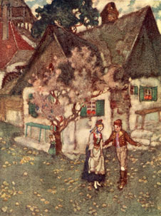 Hans and Elsa standing together in front of a house.