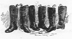 Three pairs of boots standing upright next to each other.