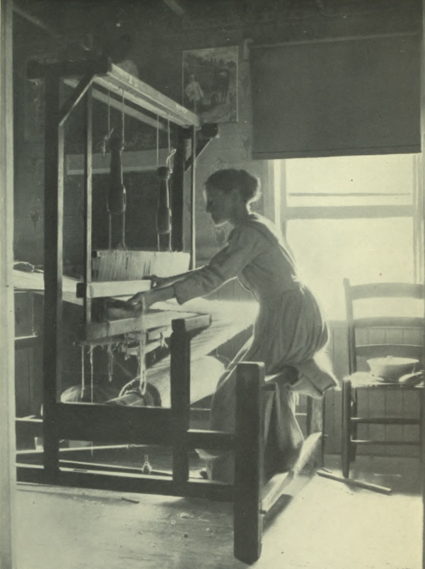 Woman working at the loom.