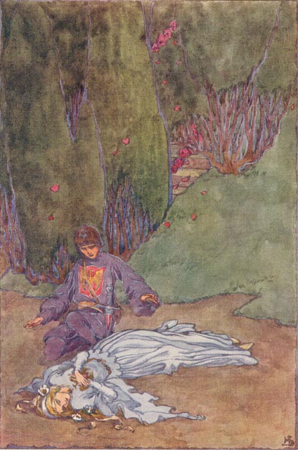 woman holding bird to her chest lying on the ground with young man kneeling over her