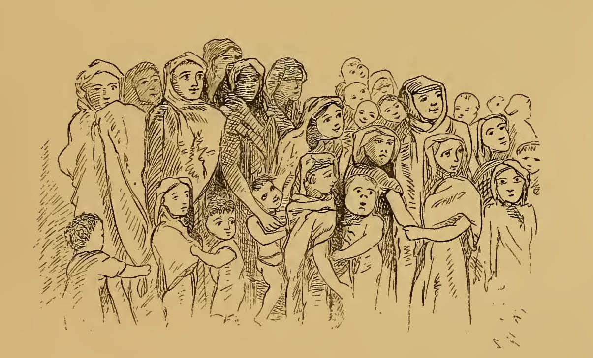 large family standing together, caption: The Soubah's Small Family
