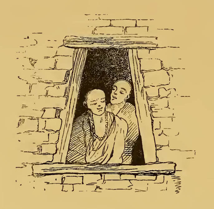 two monks looking out a window