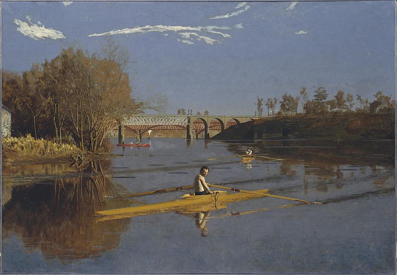 man rowing on a river