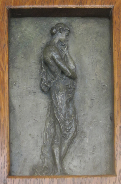 relief sculpture of woman in profile