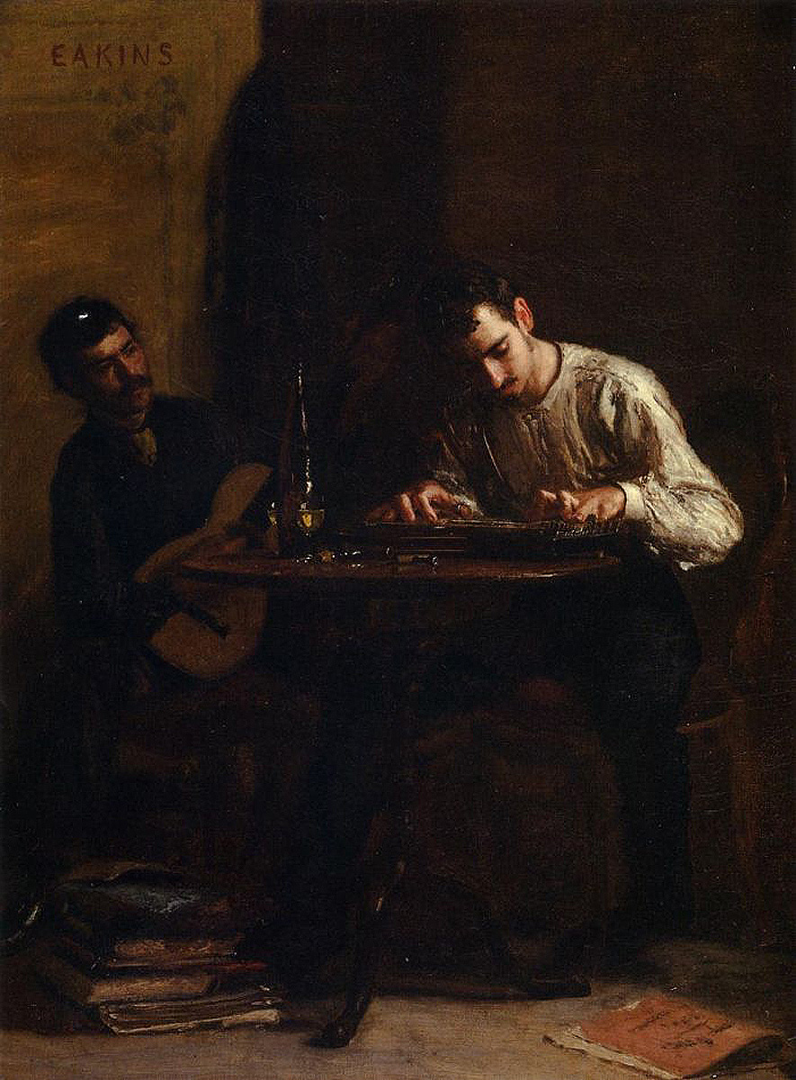 two musicians playing together at a small table