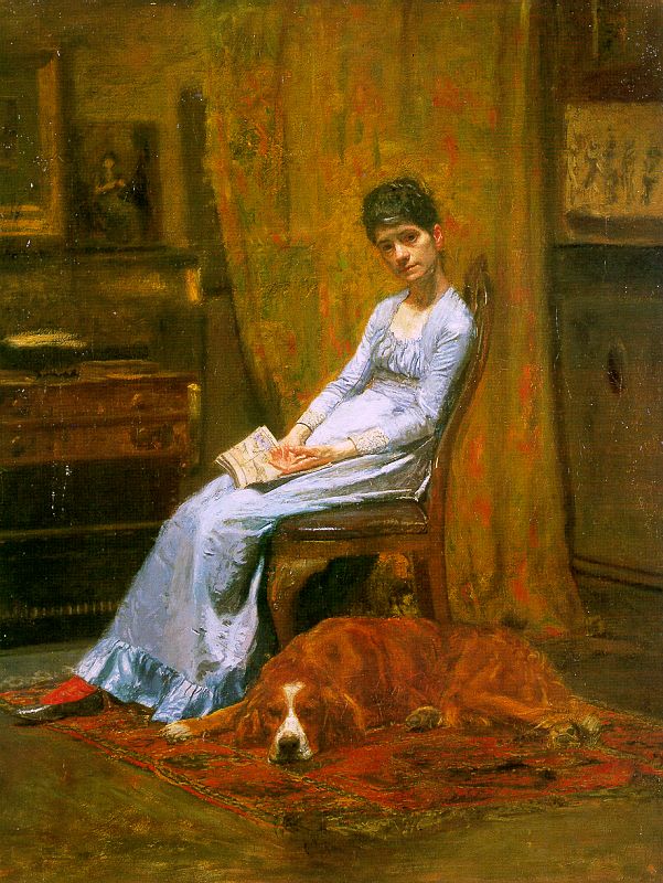 seated woman in blue dress with book in her lap and large dog laying beside her