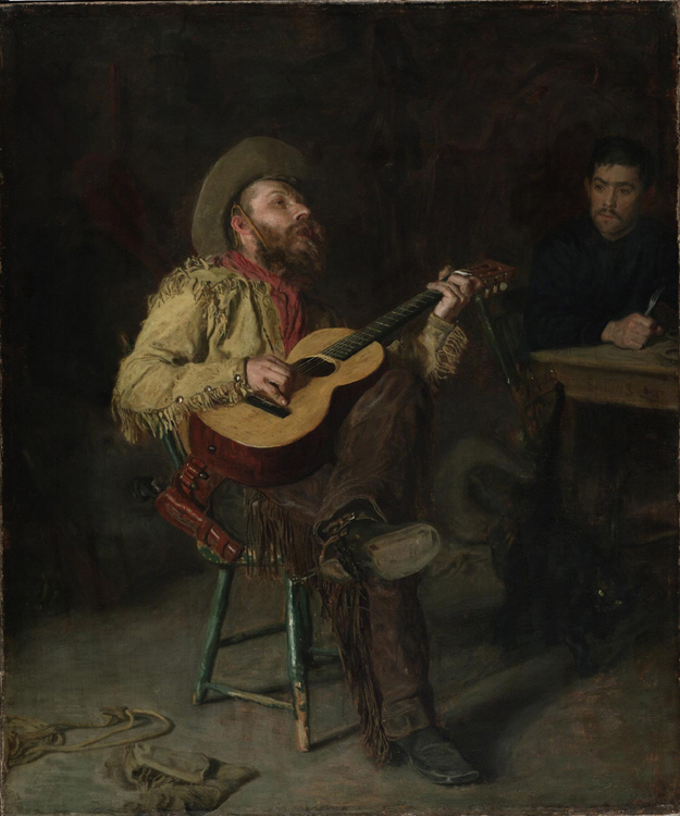 man in hat with guitar