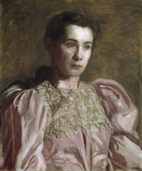 woman in dress with lace and puffy sleeves