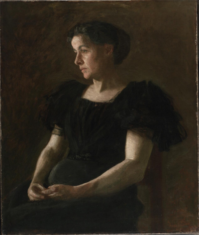 woman in black short-sleeved dress