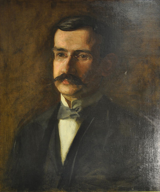 man with moustache and bowtie