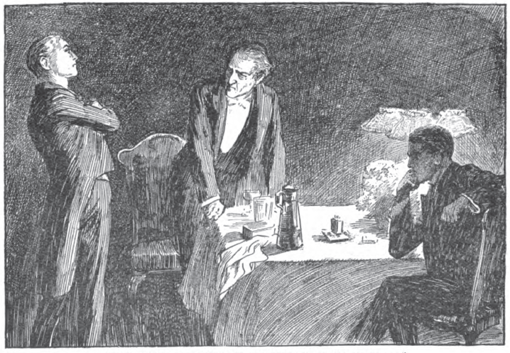 Three men, one standing, one getting up from a table, one sitting