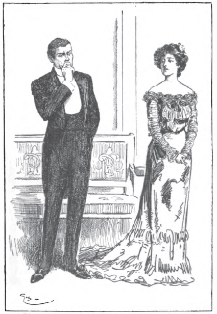 Man and woman in evening dress standing and talking