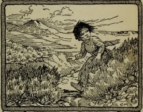 child running through scrub, mountains in the distance