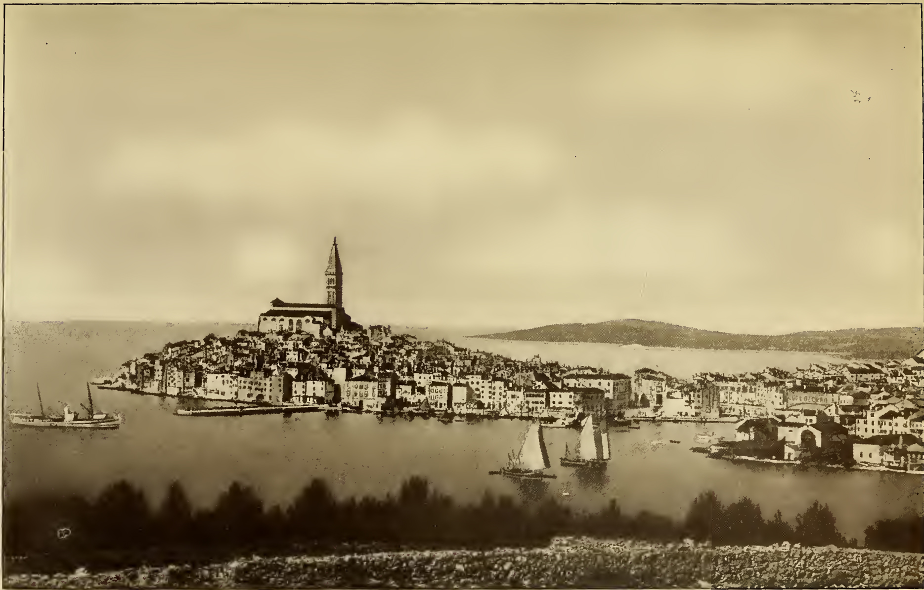 City by water. Caption: Rovigno General View, Cathedral of St. Eufemia, Towering Above the City.