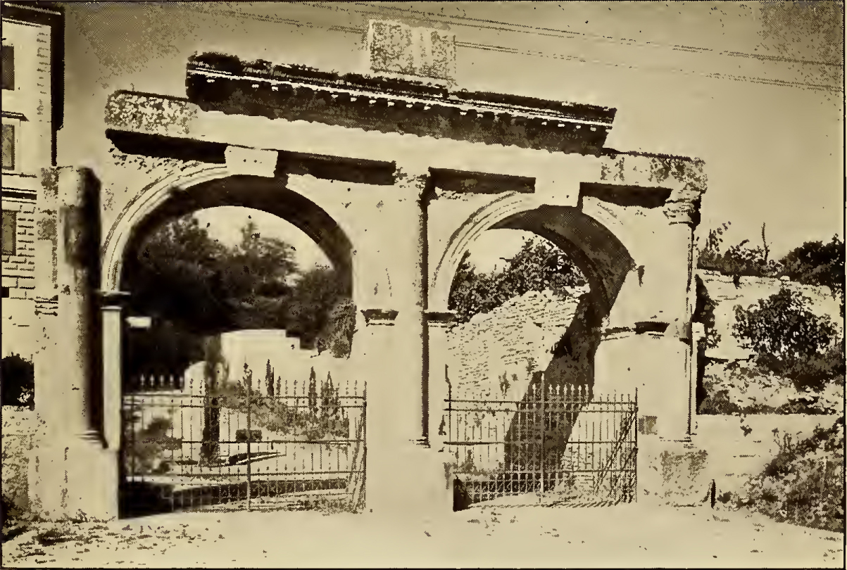 Twin arched gateway. Caption: Porta Gemina.
