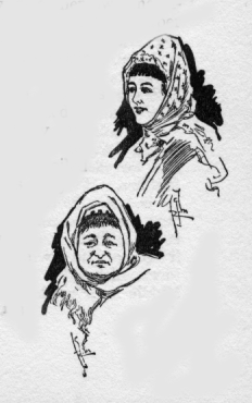 Two women wearing head scarves.